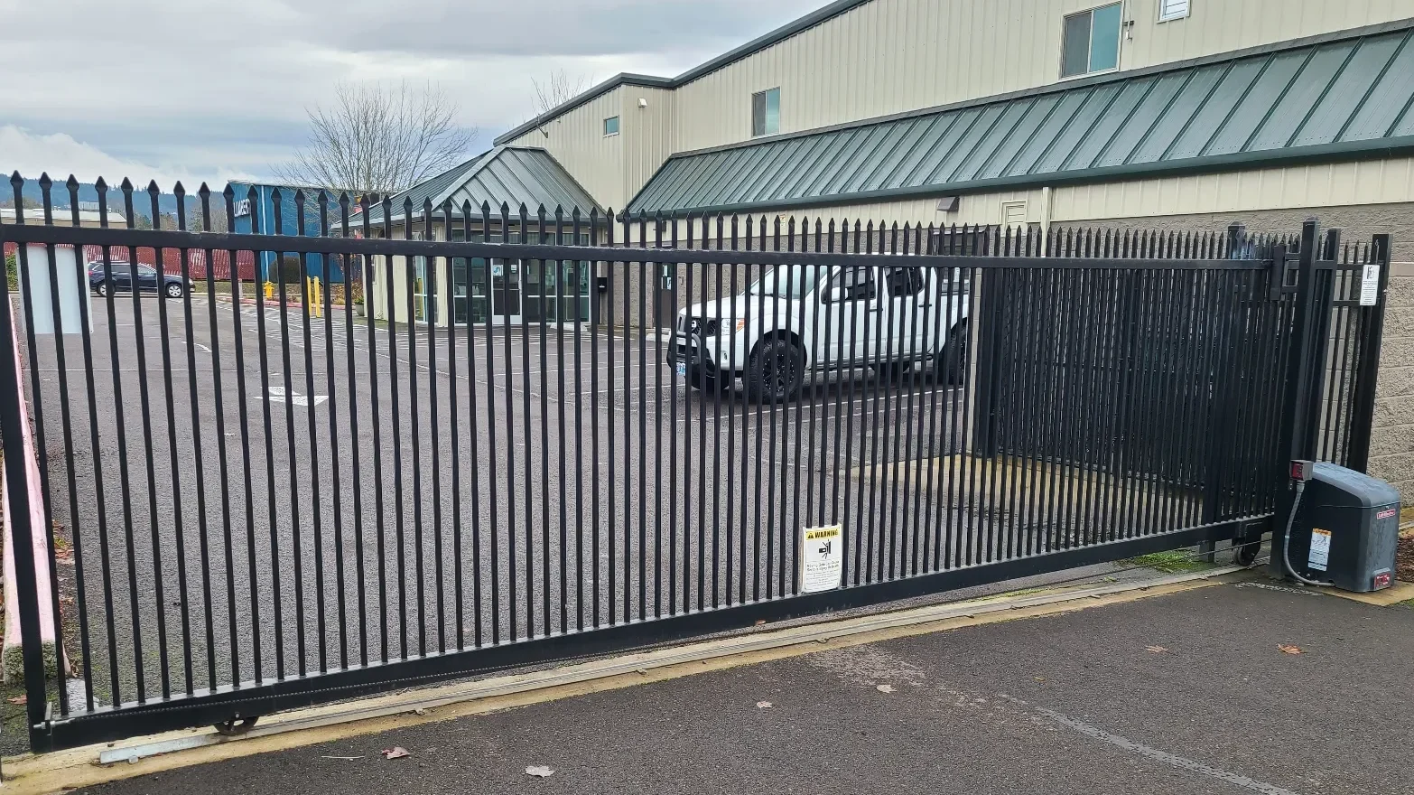 Florida business with custom commercial security driveway gate installed
