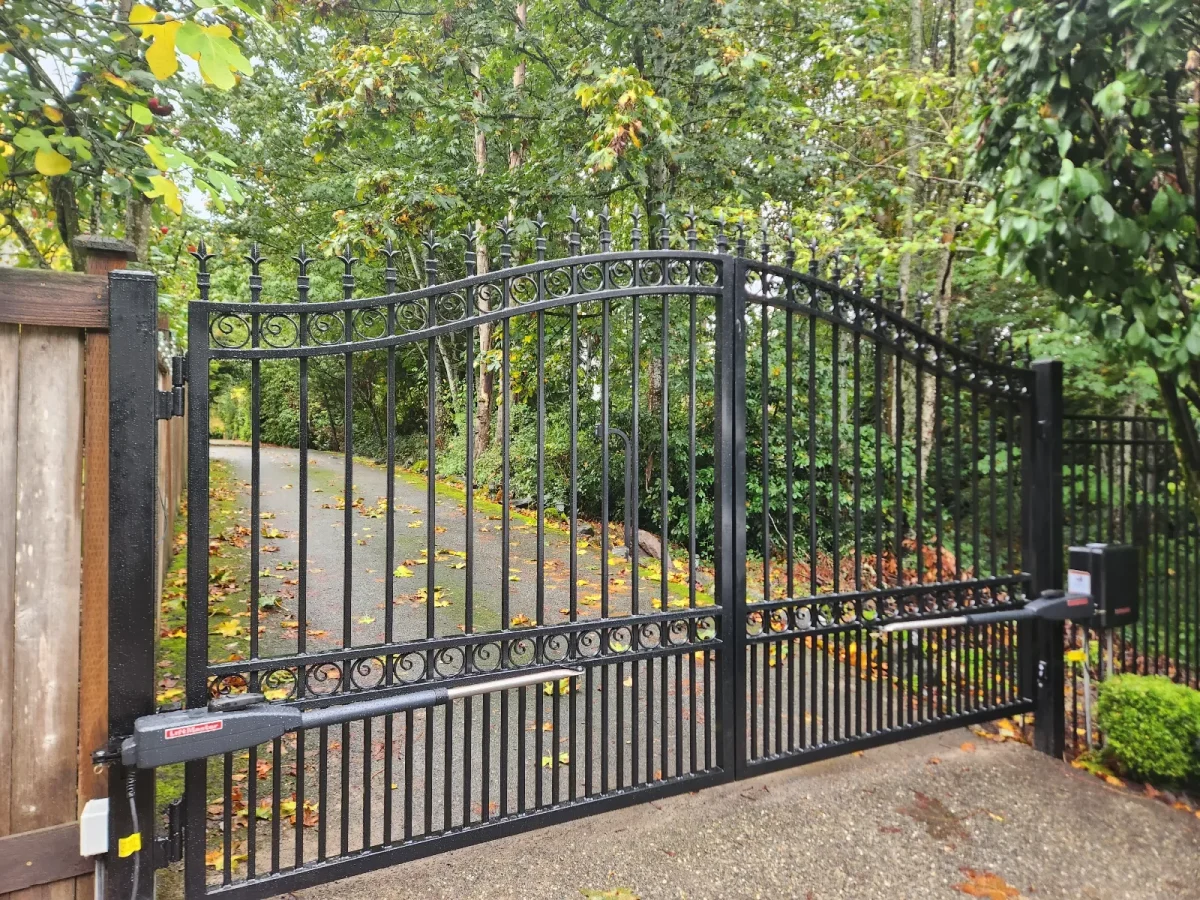 Black powder coated swing wrought iron gate with spear top pickets