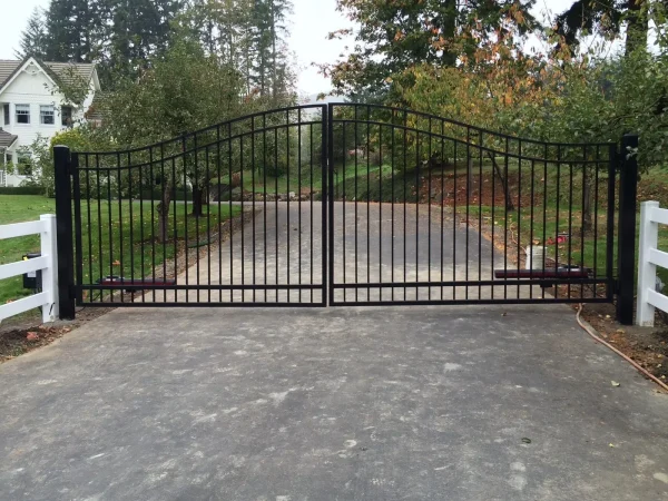 Automated metal driveway gate with keypad entry and gate opener system