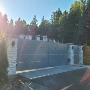 Double swing privacy driveway gate with solid horizontal panel construction