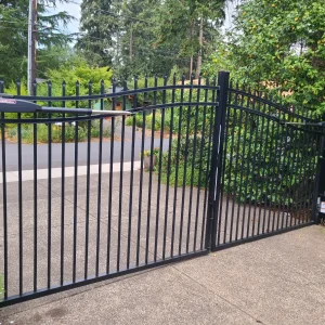 Powder coated wrought iron driveway gate with automatic motor system