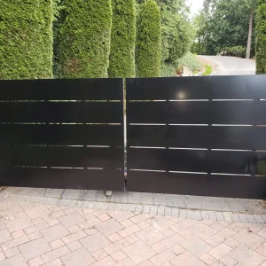 Modern aluminum metal gate with horizontal slats and powder coated finish